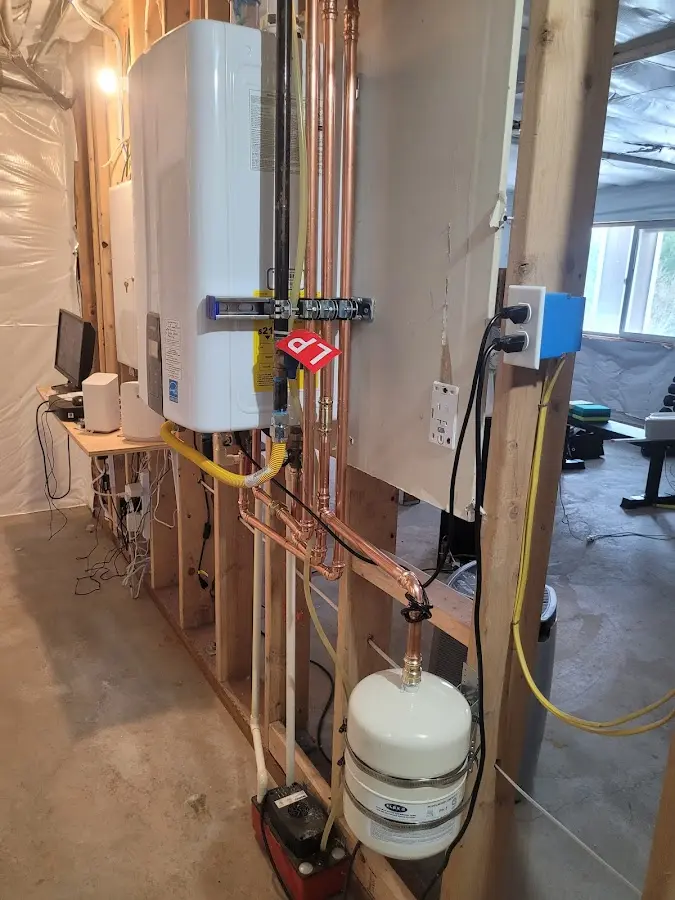 Licensed plumber repairing a kitchen sink in Coleman